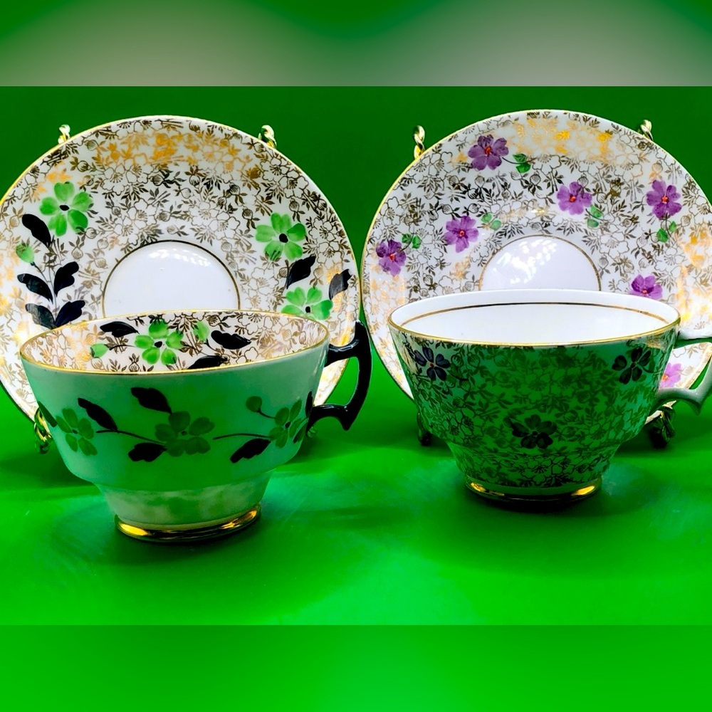 Pair of Phoenix TF&S Ltd. Gold Chintz Patterned Bone China Teacup and Saucers.
